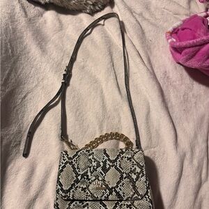 GUESS Black and Cream Patterned Crossbody Bag